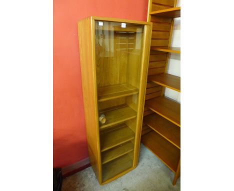 An Ercol slim bookcase