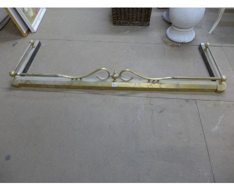 A 19th Century brass extending fender