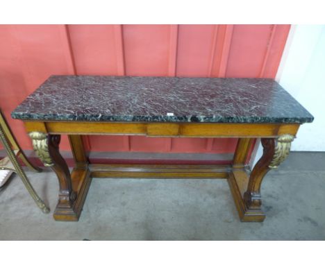 A George IV oak, parcel gilt and marble topped console table