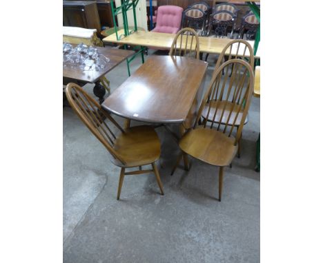 An Ercol drop-leaf table and four chairs