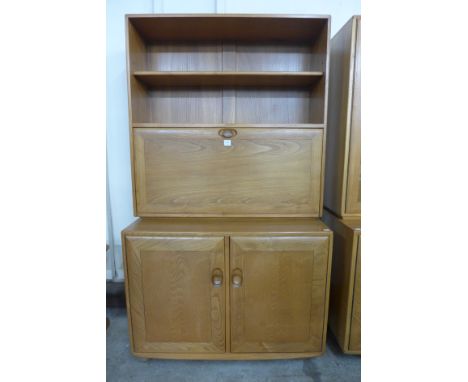 An Ercol bureau bookcase
