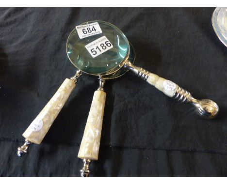 MAGNIFYING GLASSES. Three mother of pearl magnifying glasses