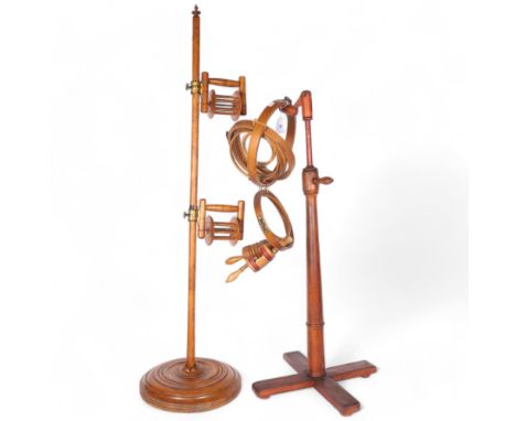 A fruitwood wool winder, and a tapestry adjustable stand with a selection of various frames 
