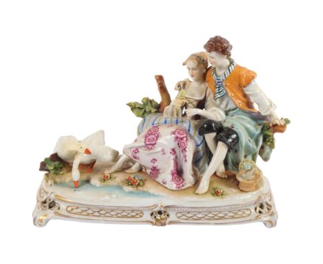A Naples figure group, depicting a couple sitting on a bench next to some swans, L28cm 