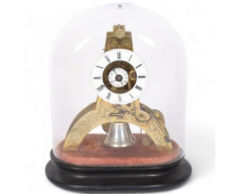 A 19th century French miniature brass skeleton alarm clock, with silk suspension, white enamel dial, Roman numerals, also whi