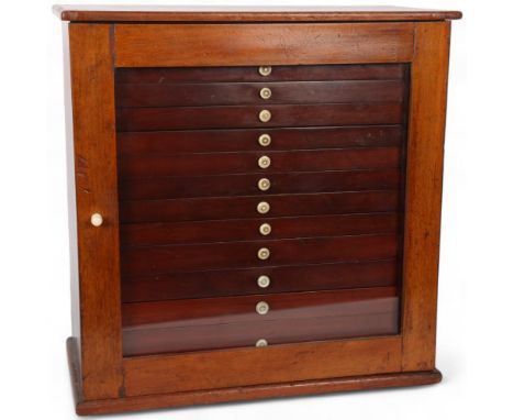 A Victorian mahogany collector's cabinet, the single glazed door showing a set of 13 fitted drawers, 42cm x 42cm x 20.5cmGood