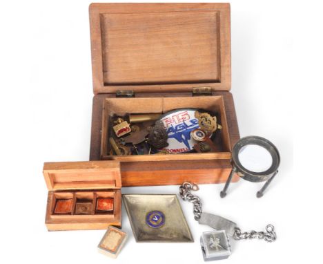 A Royal Indian Army Service Corps teak box, with engraved crest, a quantity of various military badges, including an identity