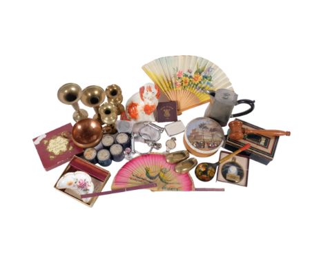 A 19th century Pratt Ware pot lid, a Staffordshire mantel Spaniel, a collection of South General Motors Africa Ltd tins, a pa