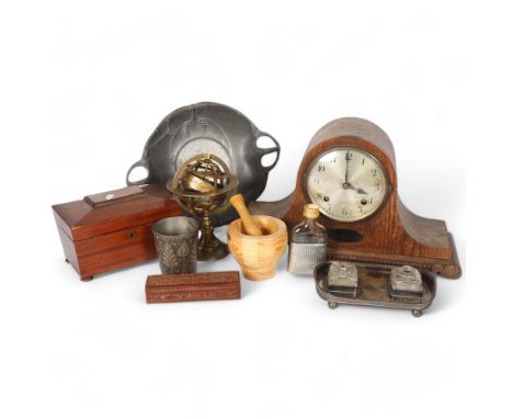 A Napoleon hat oak-cased mantel clock, a tea caddy, spirit flask, etc 