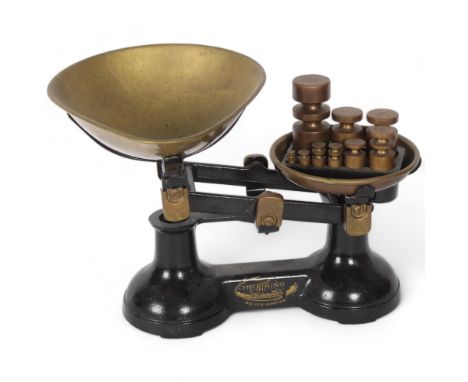A set of Vintage kitchen scales, titled "The Viking, Wolverhampton", with a set of graduated brass weights, scales length app