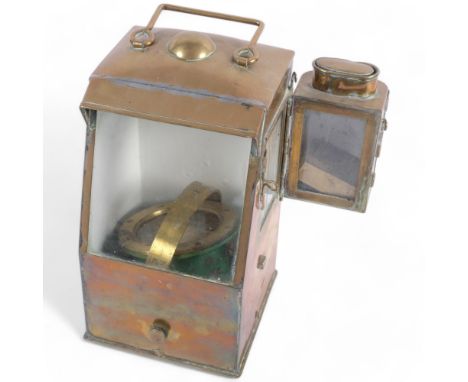 A brass-cased gimballed ship's compass, with attached hinged brass lantern, H27cm 