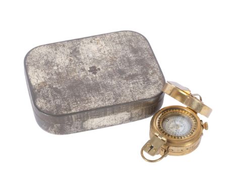 T G & Company Ltd London, a military brass compass, Mk II model 1940, NA266322, and a 1941 military tin with Broad Arrow 