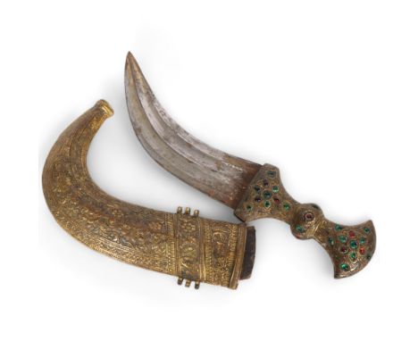 An Indian brass jambiya, a coloured glass decorated handle and engraved scabbard, blade length 18cm, overall 30cmGood overall