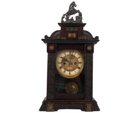 A brass dial 2-train mantel clock, in carved stained wood case with horse pediment, height overall 53cm 