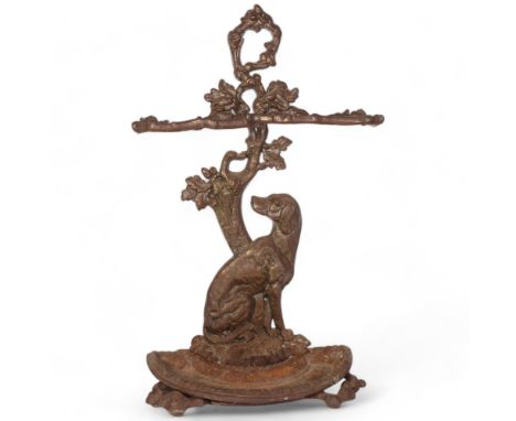 A Victorian cast-iron stick stand, with dog and foliate support, H72cm 