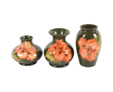MOORCROFT - a group of 3 Moorcroft tube-lined vases in Hibiscus pattern, tallest 10.5cmAll in good condition, some surface we
