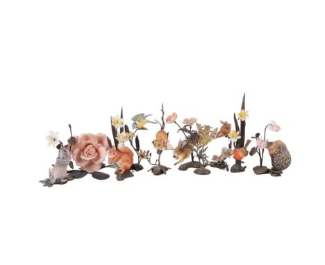A group of 10 Royal Worcester porcelain animals and birds, on metal stands, boxed 