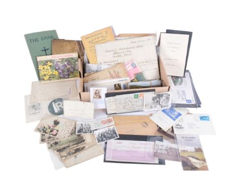 A box of various Vintage postcards, a Boston Massachusetts pendant, First Day Cover stamps, deeds and indentures, various let