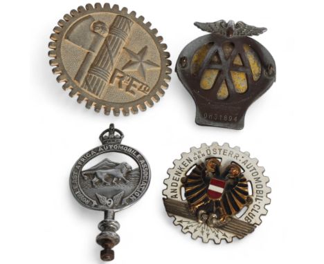 A group of 4 motoring car badges, including a Vintage AA car badge number OH31894, a World War II Royal Army Military tank pl