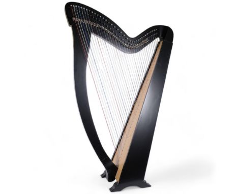 A modern 36-string Celtic style harp, with associated softshell casing 