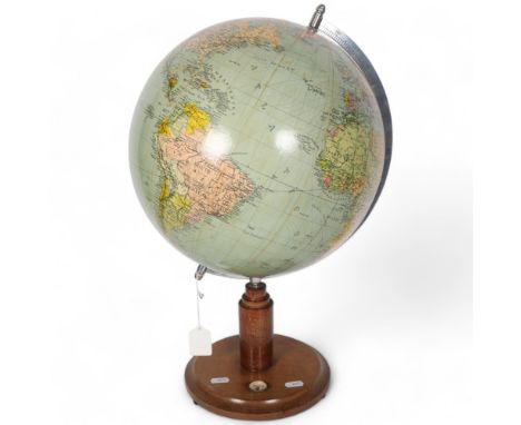 A 12" terrestrial globe on stand with inset compass, H50cm 
