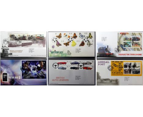Fourteen albums containing Royal Mail First Day covers
All in official red albums.