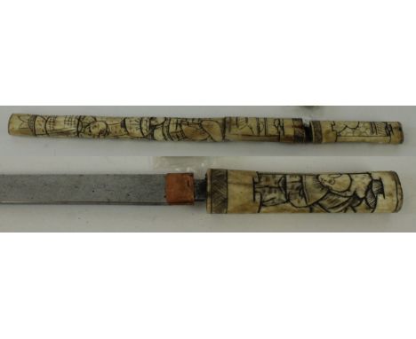 A Japanese Tanto 19th Century
The 29cm single edged straight blade, with copper habaki, the nakheo (tang) signed,complete wit