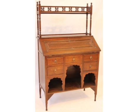 Post War Arts & Crafts bureau with shelf back
In the manner of William Burgess, having nine stylised cross designs above fall