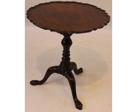 An 18th Century style mahogany tilt-top tripod table with 'Bird Cage' column, probably Victorian 
The dished Chippendale desi