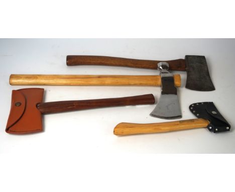 A modern Tomahawk type axe
With chromed axe head, wooden shaft, six further survival axes. (7)