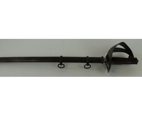 An Italian model 1871/1909 troopers sword
91cm curved single edged blade, with pierced steel guard and wooden grip, grip stam