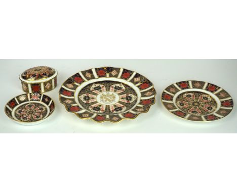 A collection of Royal Crown Derby Imari pattern wares 
Pattern no. 1128 to include an oval lidded pot, a scalloped rim desser
