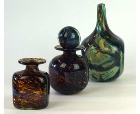 A Mdina glassware designed by Michael Harris
To include axe head vase having four faceted sides with internal multi coloured 