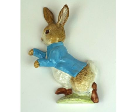 A Beatrix Potter Peter Rabbit plaque, circa 1967-1969
Designed by Graham Tongue, first version, modelled wearing a blue jacke