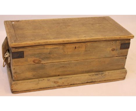 A Victorian striped pine trunk
The rectangular form with hinged lid enclosing storage space, flanked by twin handles and rais