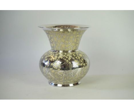 Circa 1950's Heinrich ceramic vase 
Of bulbous form with flared neck, having silver overlay depicting figures on horse back s