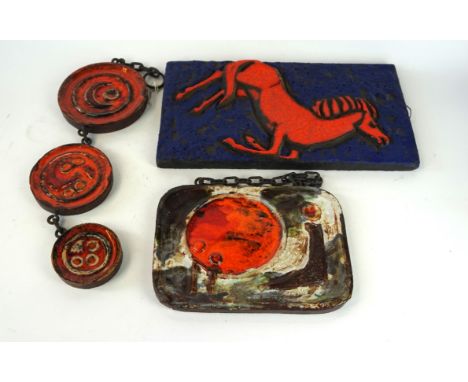 Three West German Fat Lava wall plaques 
To include a Ruscha rectangular example decorated with an orange horse on a blue lav