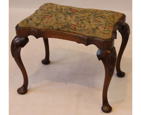 A George I style walnut framed dressing stool with woolwork tapestry drop-in seat, early 20th Century
Underside bears trade p