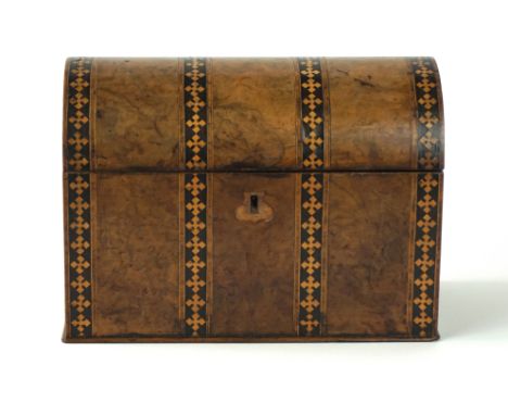 A 19th Century walnut veneered and inlaid tea caddy
Of casket form, the domed cover revealing two tea compartments, one lacki