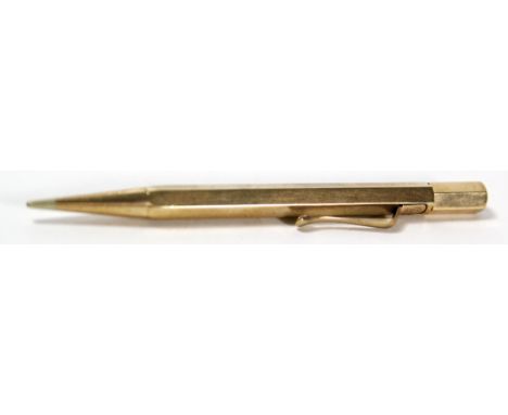 A 9ct gold propelling pencil 
Stamped 9 and 375 to end and with engraved initials F.L.A, approx 12cm long. 