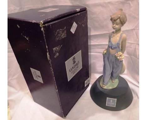 Boxed Lladro Collectors Society figurine, Pocket Full Of Wishes 7650 on a Lladro stand, H: 26 cm, slight damage to flower. P&