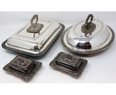 Walker &amp; Hall silver plated entrée dish with cover, with a further oval example and a pair of smaller covered condiments 