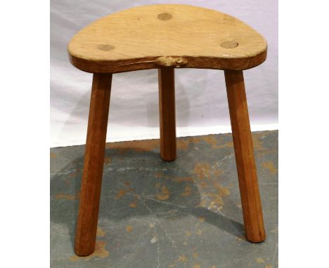 Robert Mouseman Thompson three legged stool, with carved mouse to front lip, H: 46 cm. Not available for in-house P&amp;P 