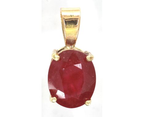 18ct gold and ruby pendant, H: 20 mm, 1.5g. P&amp;P Group 1 (£14+VAT for the first lot and £1+VAT for subsequent lots) 