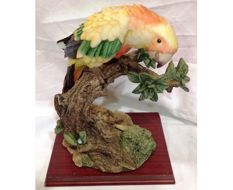 Resin parrot on stand, H: 22 cm. P&amp;P Group 3 (£25+VAT for the first lot and £5+VAT for subsequent lots) 