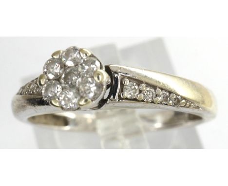 9ct gold diamond flower-head cluster ring, size M, 2.2g. P&amp;P Group 1 (£14+VAT for the first lot and £1+VAT for subsequent