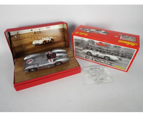 Schuco Studio III - A boxed limited edition Mercedes Benz W196 Streamline Juan Manuel Fangio 1954 Silverstone car. # 1647. Th