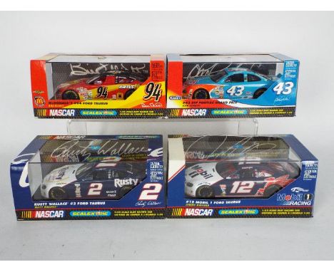 Scalextric - Four boxed Scalextric Nascar models. Lot includes C227 Pontiac STP;together with three Ford Taurus models being 