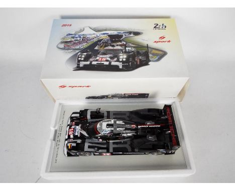 Spark - A boxed 1:18 scale Spark 18S186 Porsche 919 Hybrid RN18  Porsche Team - LMP1 HY 5th Le Mans 2015. This highly detaile