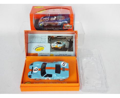 Slot.it - Two boxed 1:32 scale slot cars from Slot.it. Lot consists of a Limited Edition 'Le Mans Winners Collection' CW16 Fo